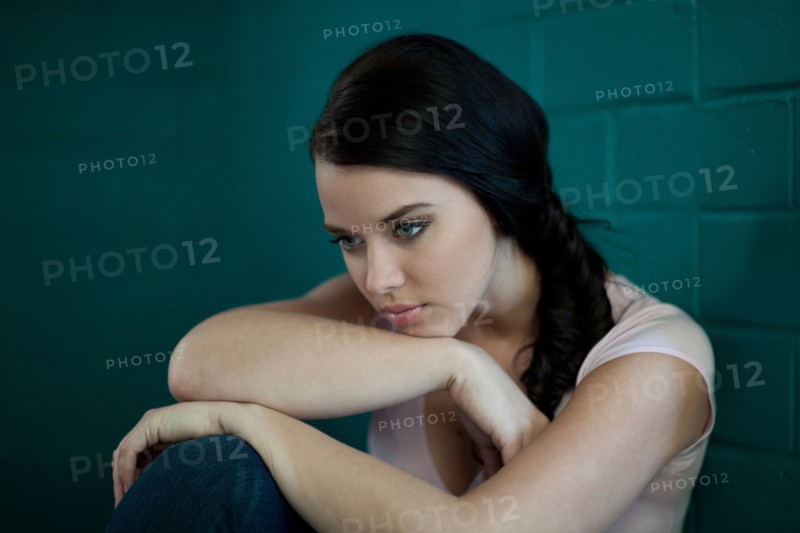 Depressed woman thinking