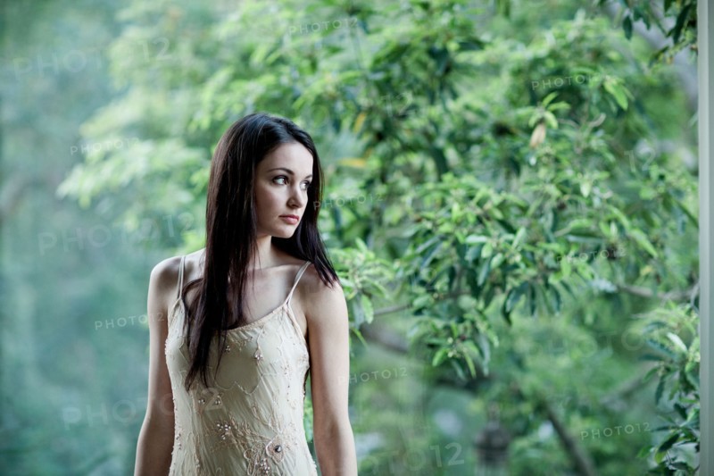 Elegant Caucasian woman standing outdoors