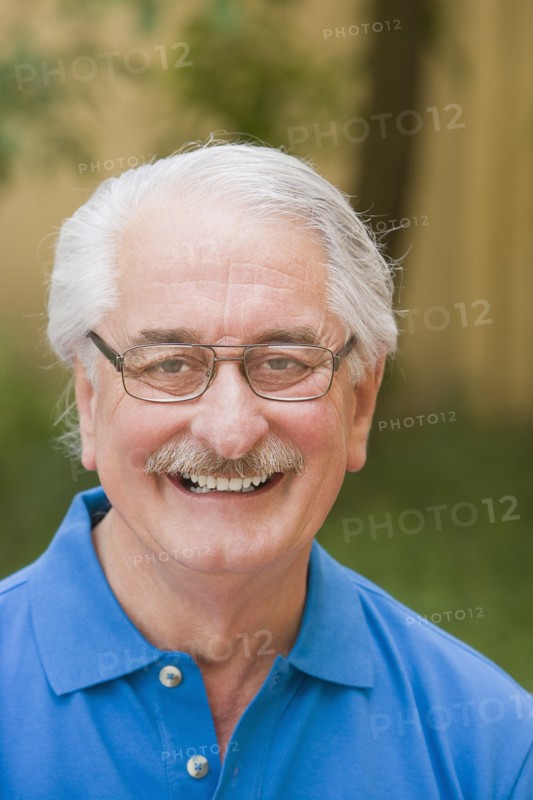 Smiling senior Hispanic man