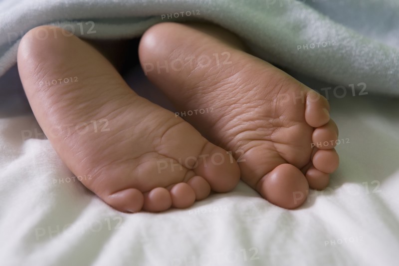 Close up of Hispanic baby boy's feet