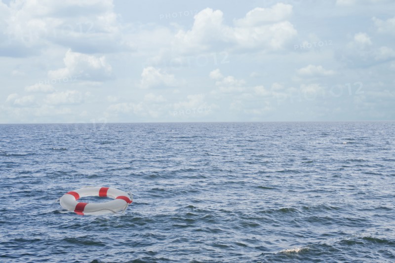 Life preserver floating in open ocean