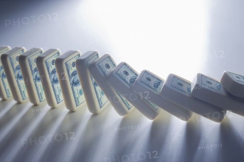 Close up of falling stacks of dollar bills