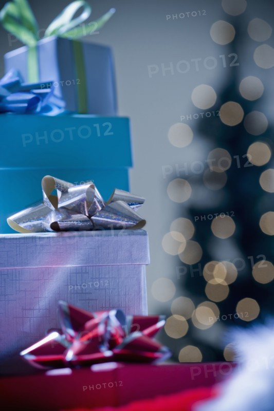 Stacks of wrapped Christmas gifts