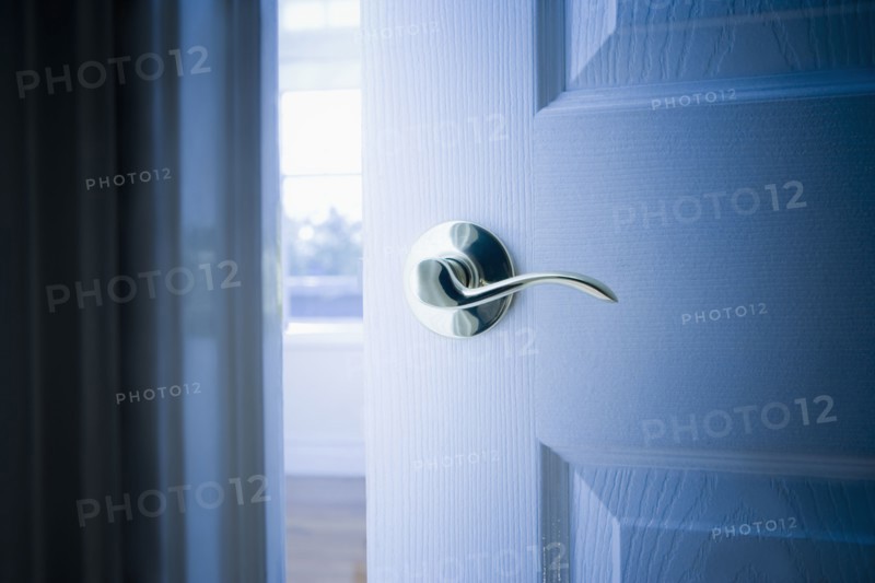 Close up of handle on open door