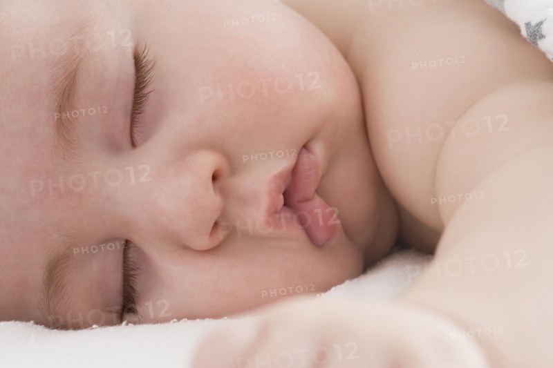 Close up of Hispanic baby boy's sleeping face