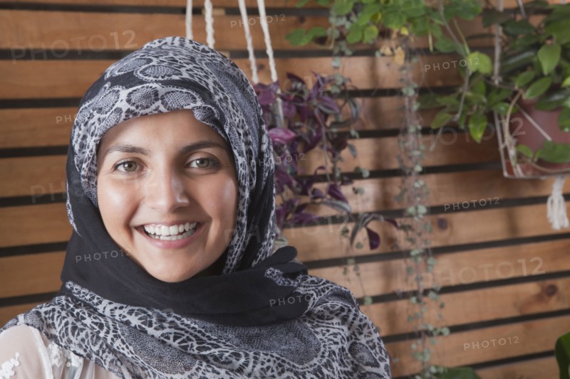 Hispanic woman wearing headscarf