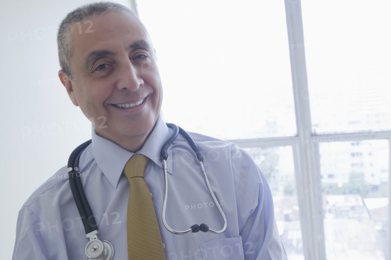 Smiling Hispanic doctor