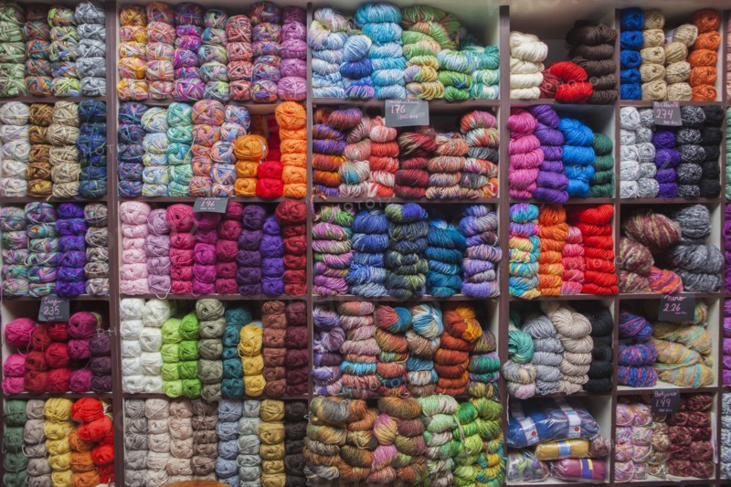Shelves full of yarn at store
