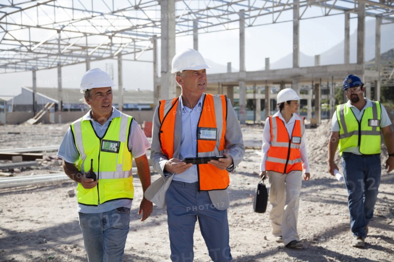 Architects talking at construction site