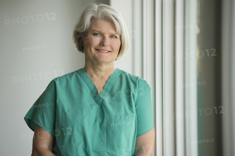Caucasian surgeon in scrubs
