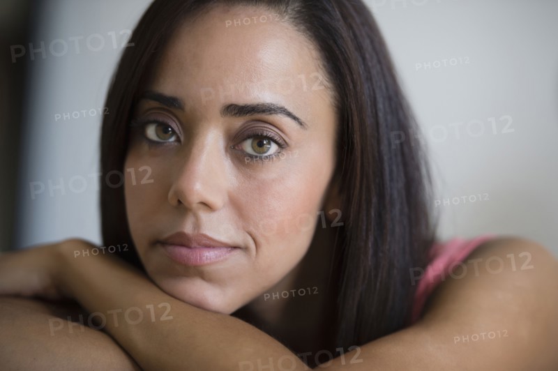 Serious mixed race woman