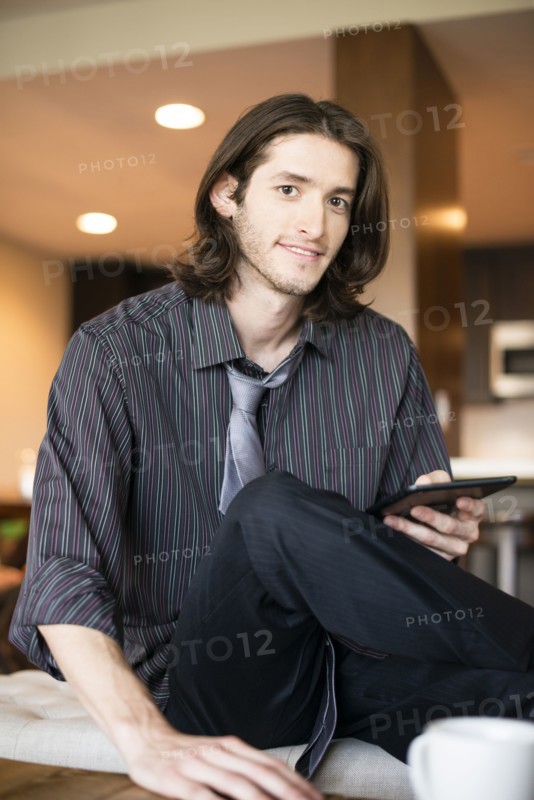 Caucasian businessman using digital tablet