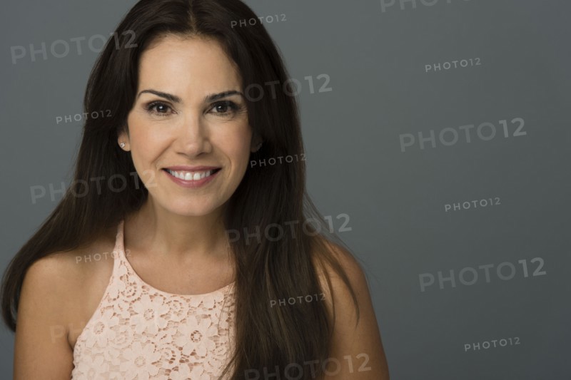 Close up of Hispanic woman smiling