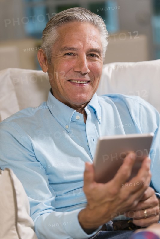 Caucasian businessman using digital tablet