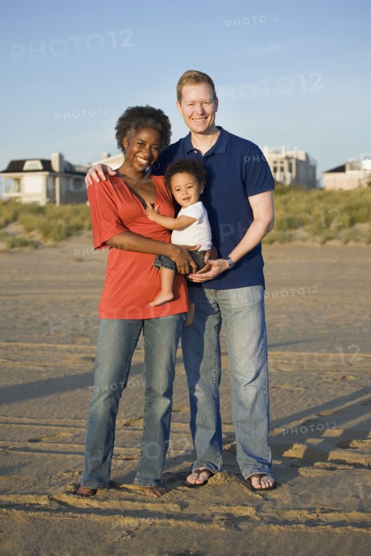 Multi-ethnic family enjoying beach