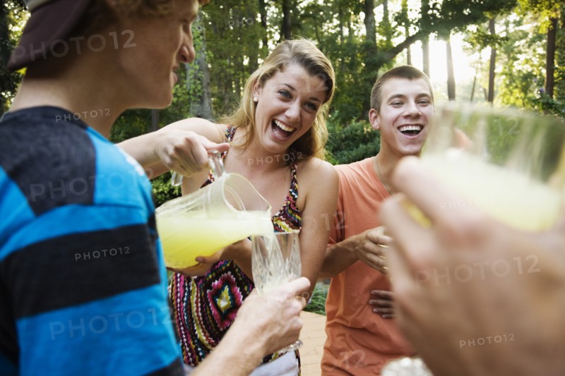 Friends hanging out together drinking lemonade