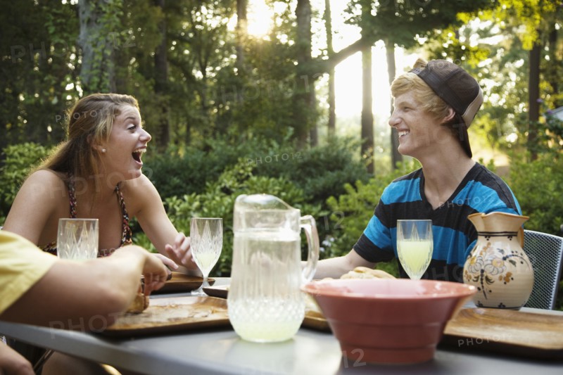 Friends hanging out together drinking lemonade