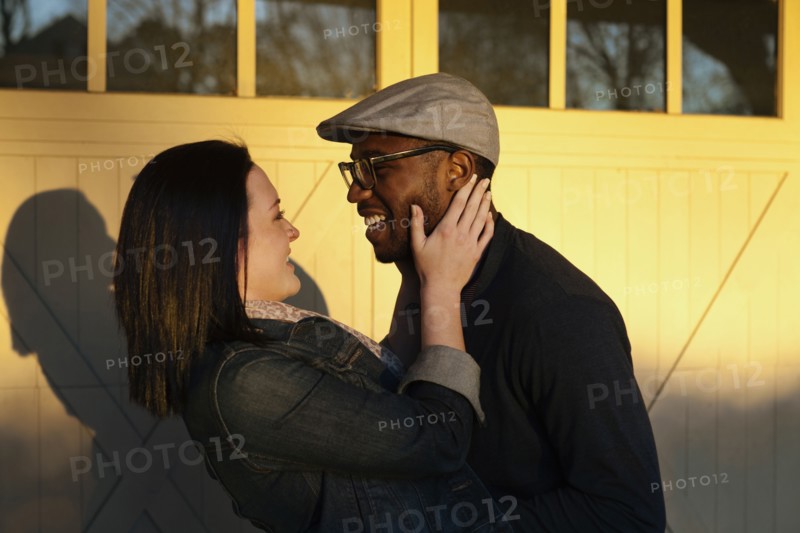Smiling couple hugging