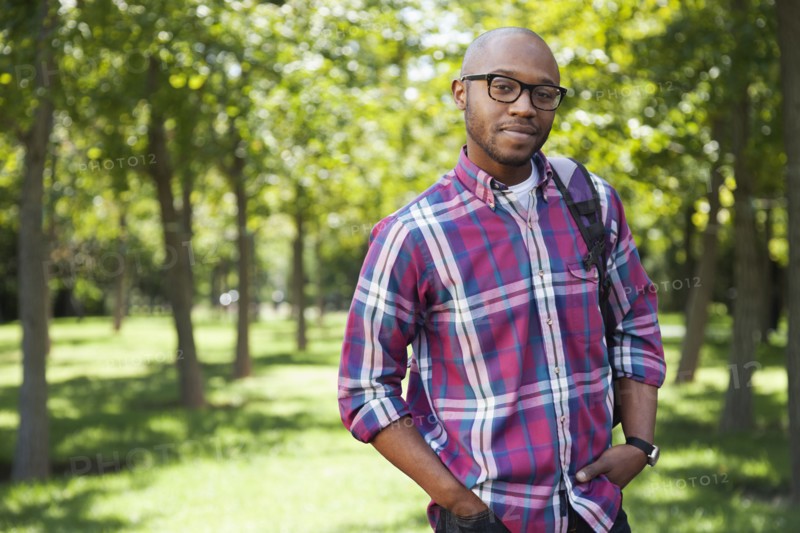 Black man smiling in park