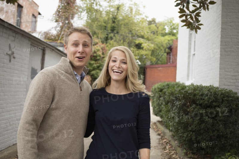 Caucasian couple hugging outdoors
