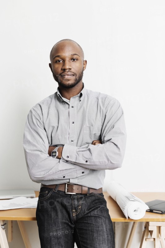 Portrait of confident Black architect in office