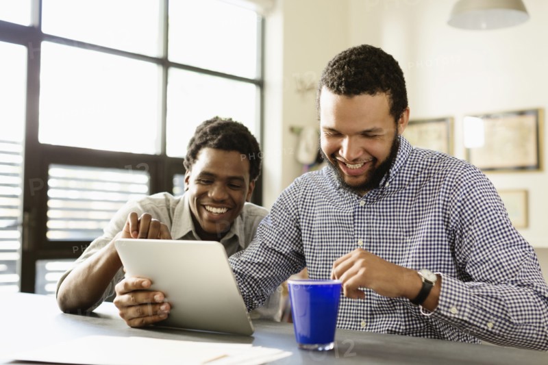 Businessmen working together in office