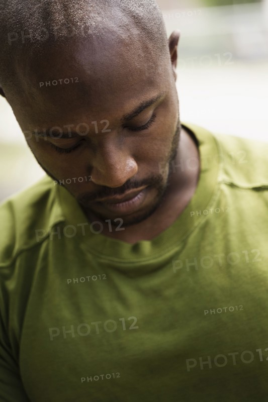 Black runner looking down