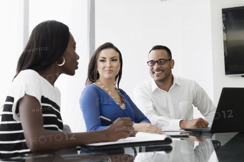 Business people talking in office meeting