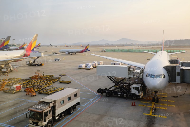 Airplanes and walkways at airport
