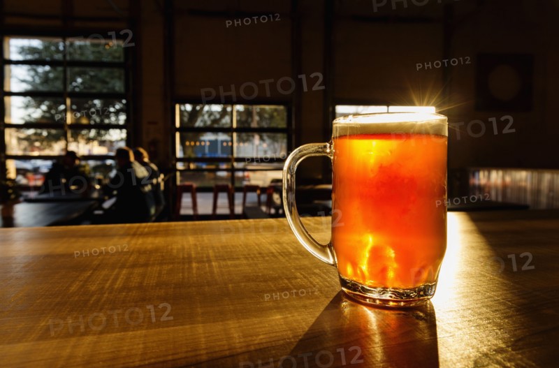 Glass of beer on counter