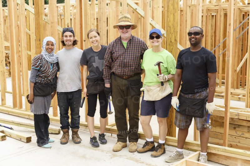 Volunteers posing at construction site