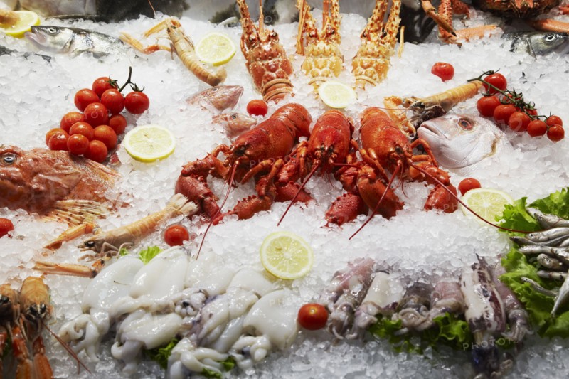 Close up of seafood displayed on ice