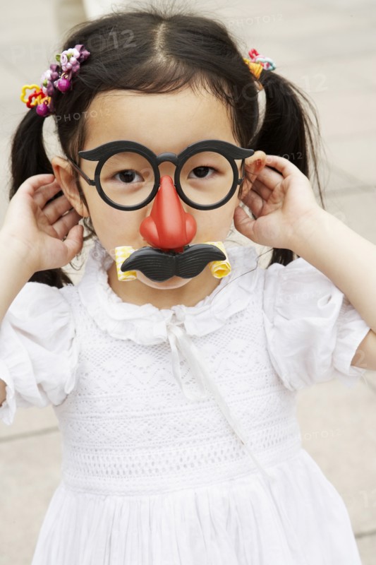 Chinese girl wearing mask with eyeglasses and mustache