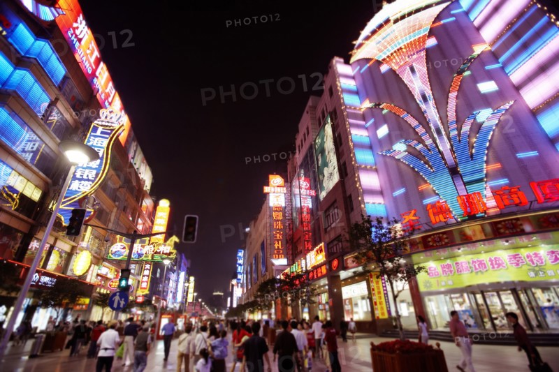 City street lit up at night