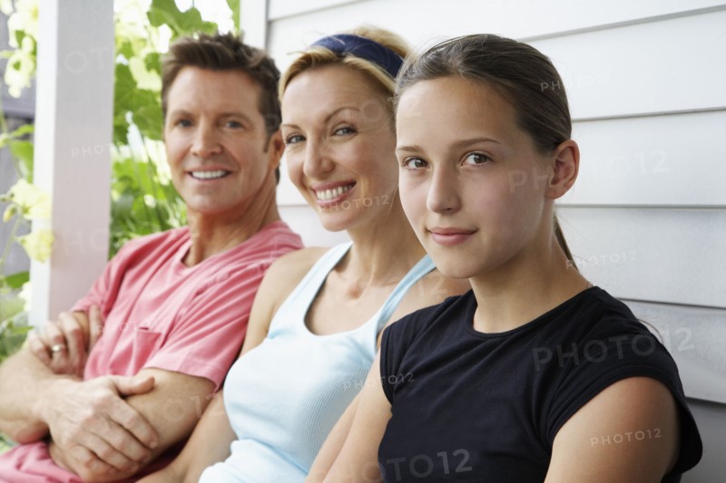 Family sitting together outdoors