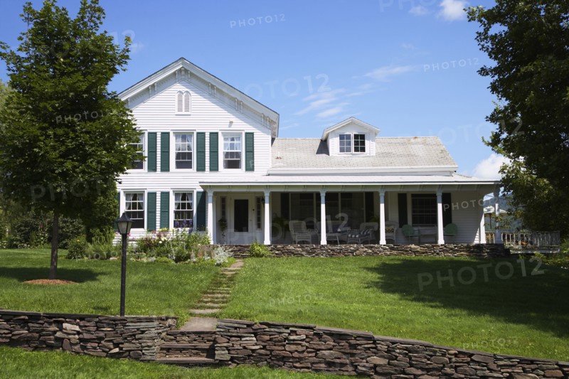 Stone wall outside suburban house