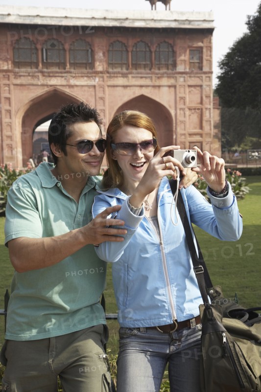 Couple taking pictures at Red Fort