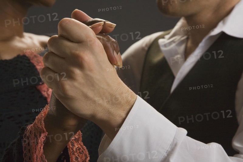 Multi-ethnic couple dancing