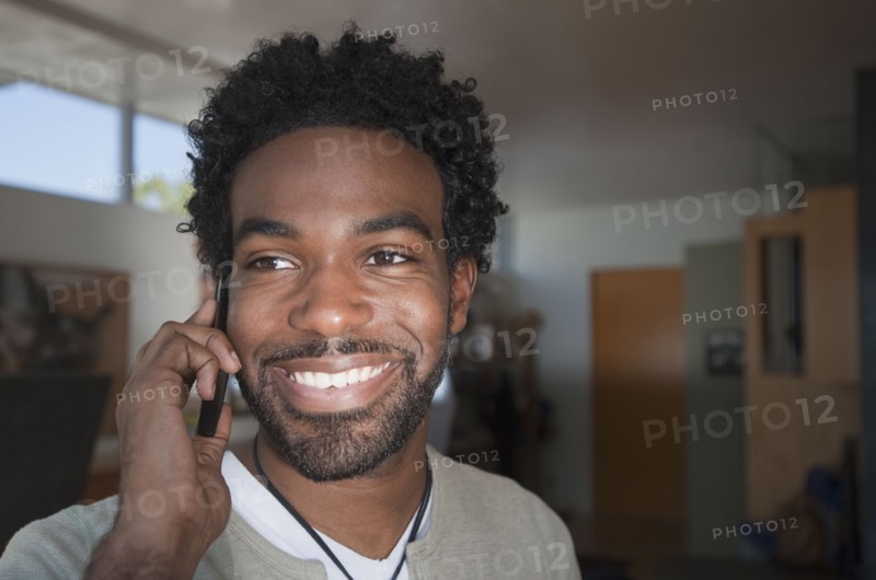 Black man talking on cell phone