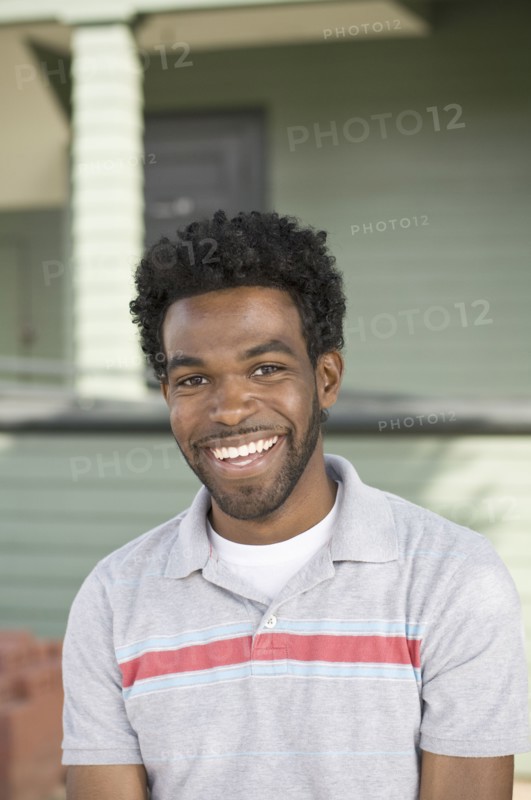 African American man smiling outdoors