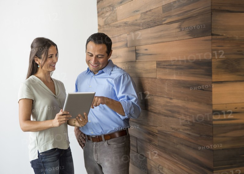 Business people using digital tablet