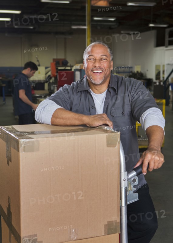 Worker smiling in warehouse