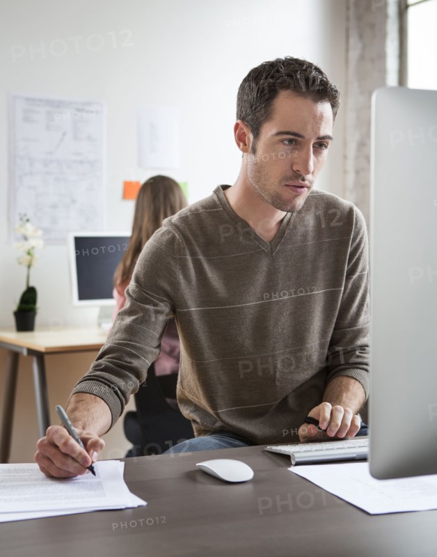 Caucasian architect working in office