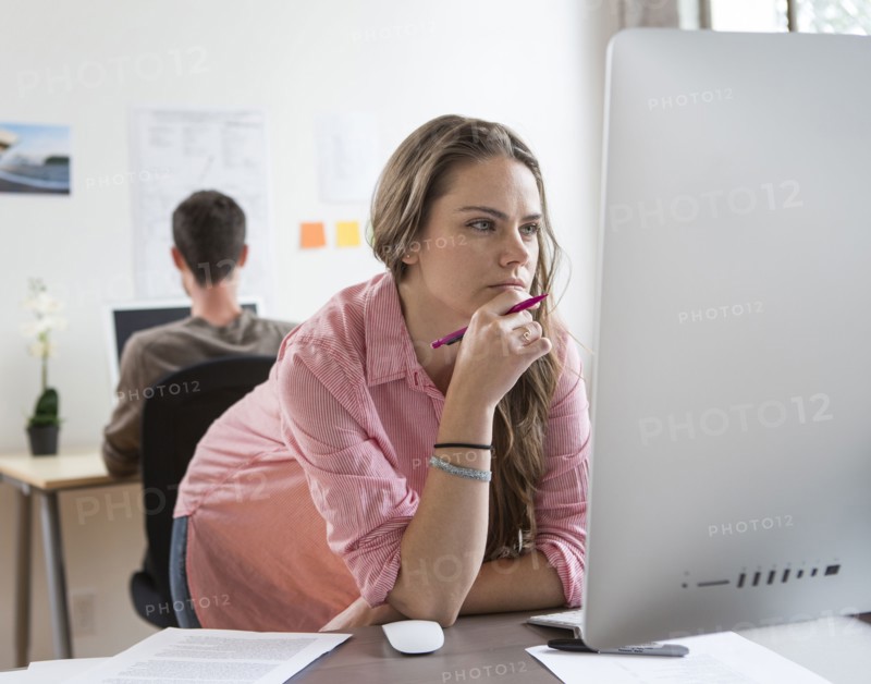 Caucasian architect working in office
