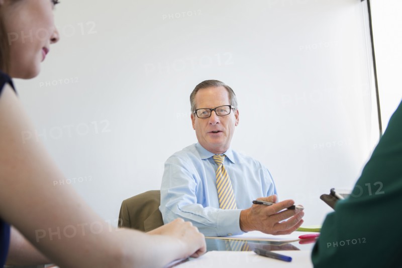 Business people talking in meeting