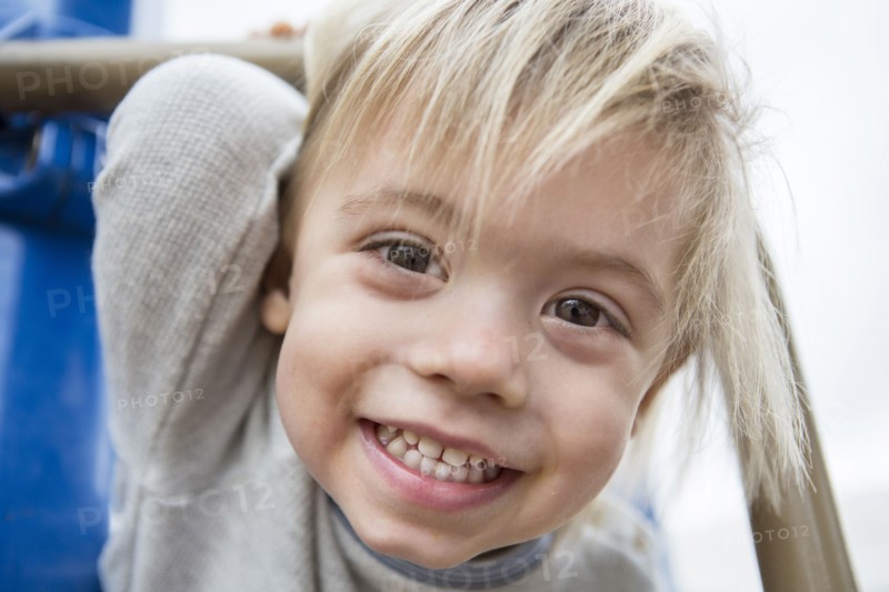 Close up of smiling face of Hispanic boy