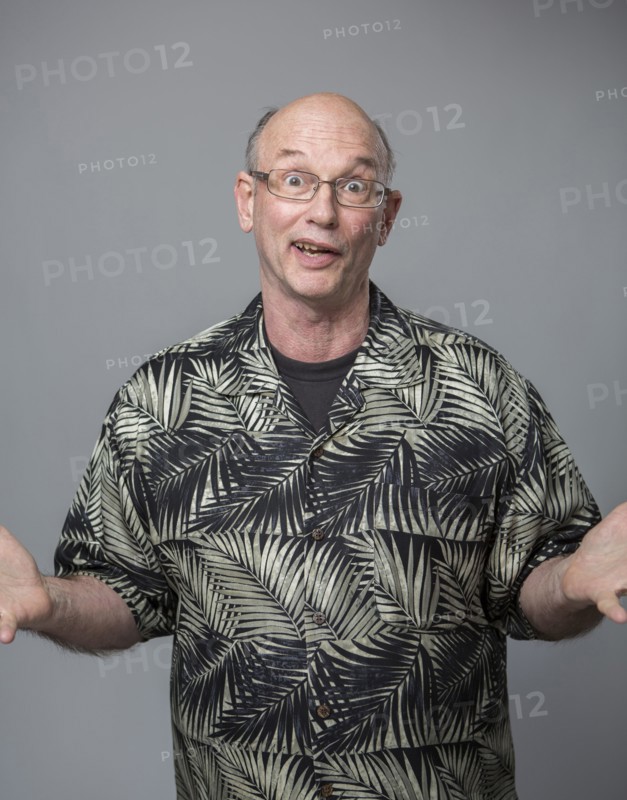 Older Caucasian man shrugging