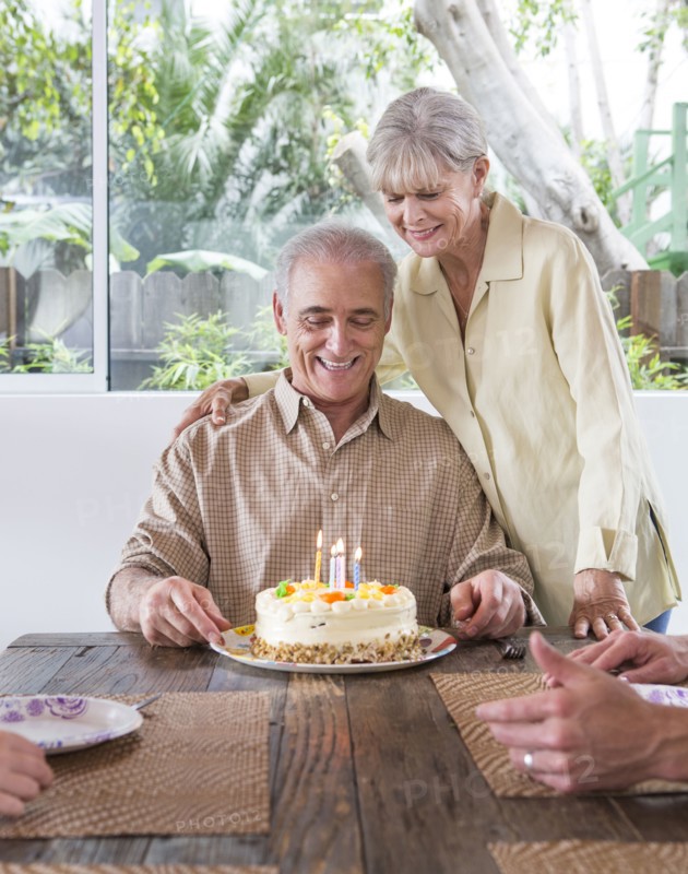 Caucasian family celebrating birthday at table