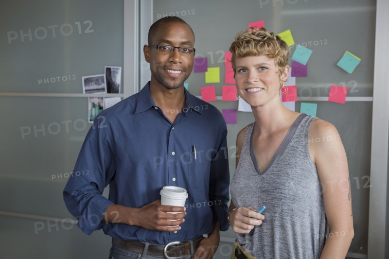 Business people smiling in office