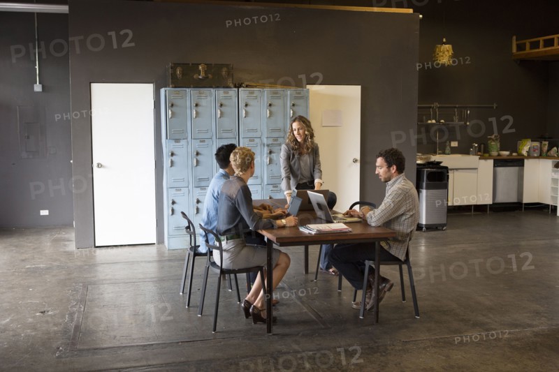 Business people talking in office meeting